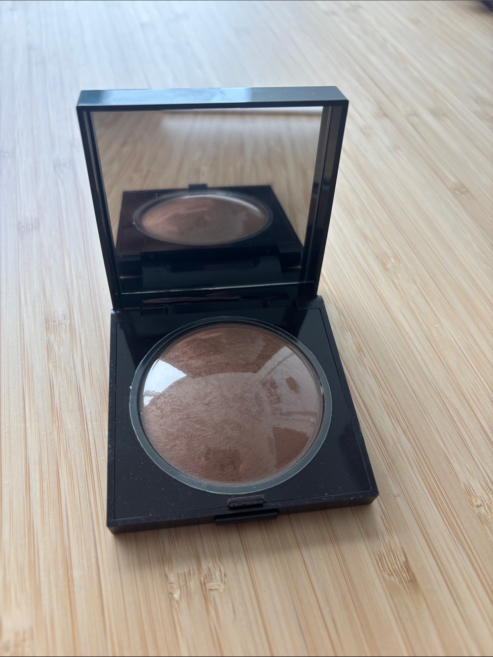 laura mercier Pressed Bronzer 03 — Deep Brown Radiance